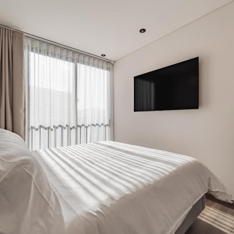 Impresionantes aptos en Edificio Morph con vista increíble a El Poblado - Habitación Triple con vistas a la ciudad - 30