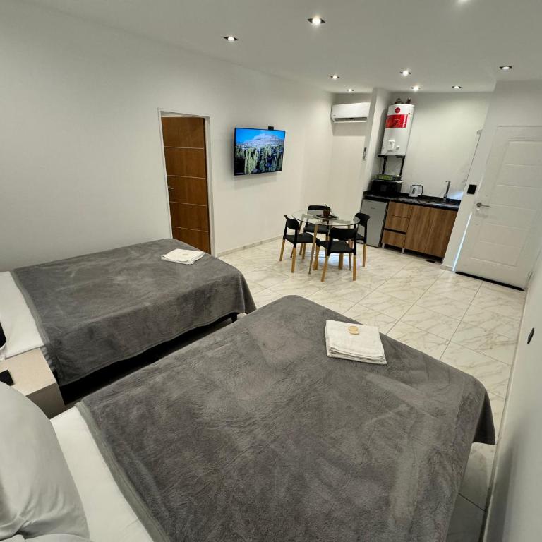 URBANA PREMIUM SUITES Apartamentos de Categoría Parking Privado - Seguridad - Sanatorio Allende - Hospital Privado - Estadio Kempes - Universidad Siglo 21 - Complejo Ferial Córdoba - Quorum - Aeropuerto Internacional Taravella - Habitación con 2 camas grandes - 3
