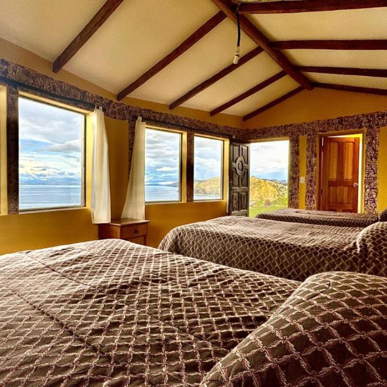 Refugio Ecologico Kalluchi - Habitación Triple con baño privado y vistas al lago - 9