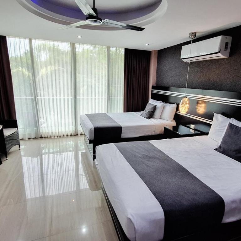 Hotel & Suites Country Valladolid - Habitación Doble con vistas a la piscina - 2 camas - 4