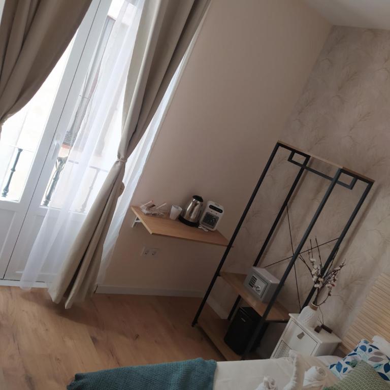 Habitaciones Universal - Single Room with Shared Bathroom - 2