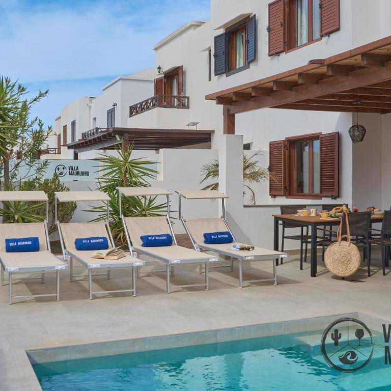 VILLA MAURUURU - 10 minutes walking to Marina Rubicón, heated pool, BBQ & office space with desk and high speed internet - Three-Bedroom Villa - 57