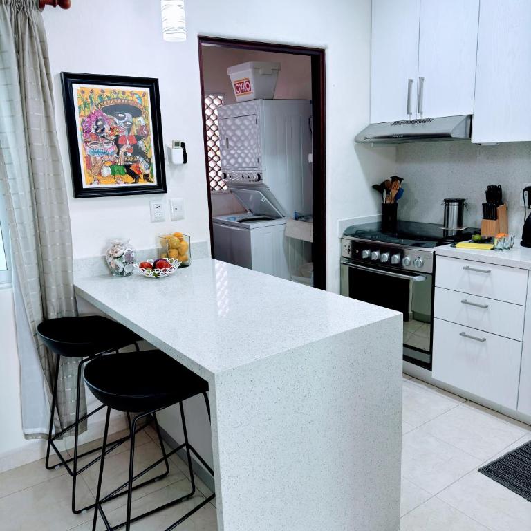 Playa Kaan Condominiums- Unit 22 - Apartment with Pool View - 17