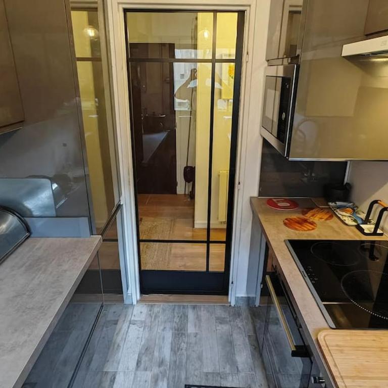 T2 meublé 1 er étage dans un quartier calme à PARIS 17 - Apartamento de 1 dormitorio - 7