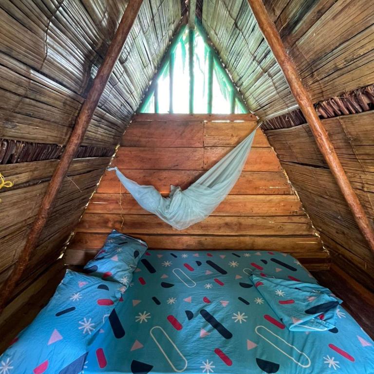 Wira Pora Hostal - Habitación Triple con vistas al jardín - 2