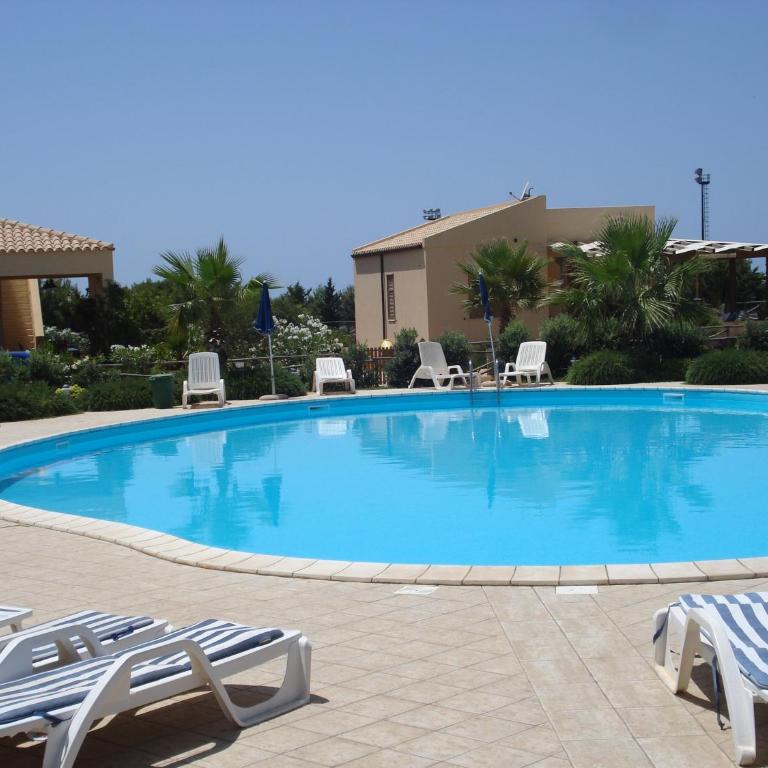 Casa Vacanze Libeccio - Villetta con giardino e piscina condominiale - Casa Vacanze - 33
