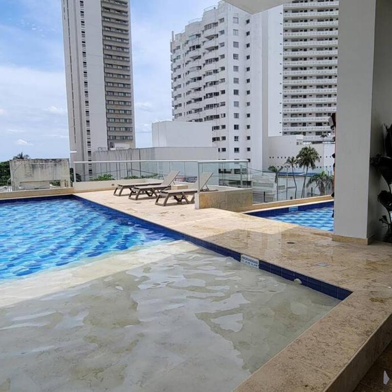 Stunning Infinity Pool, Balcony, steps from Walled City & Marbella Beach - Three-Bedroom Apartment - 30