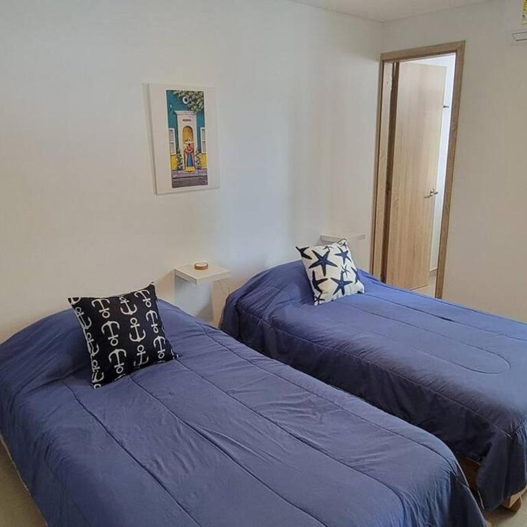 Stunning Infinity Pool, Balcony, steps from Walled City & Marbella Beach - Three-Bedroom Apartment - 14