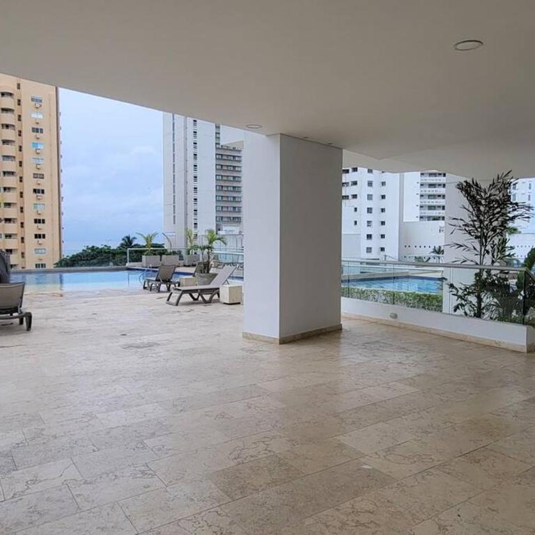 Stunning Infinity Pool, Balcony, steps from Walled City & Marbella Beach - Three-Bedroom Apartment - 35