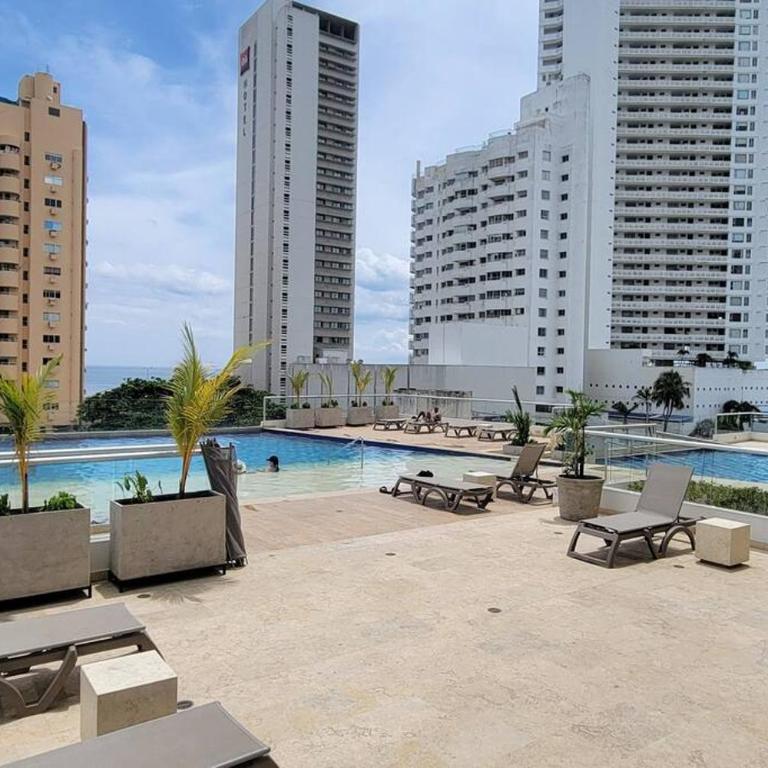 Stunning Infinity Pool, Balcony, steps from Walled City & Marbella Beach - Three-Bedroom Apartment - 5