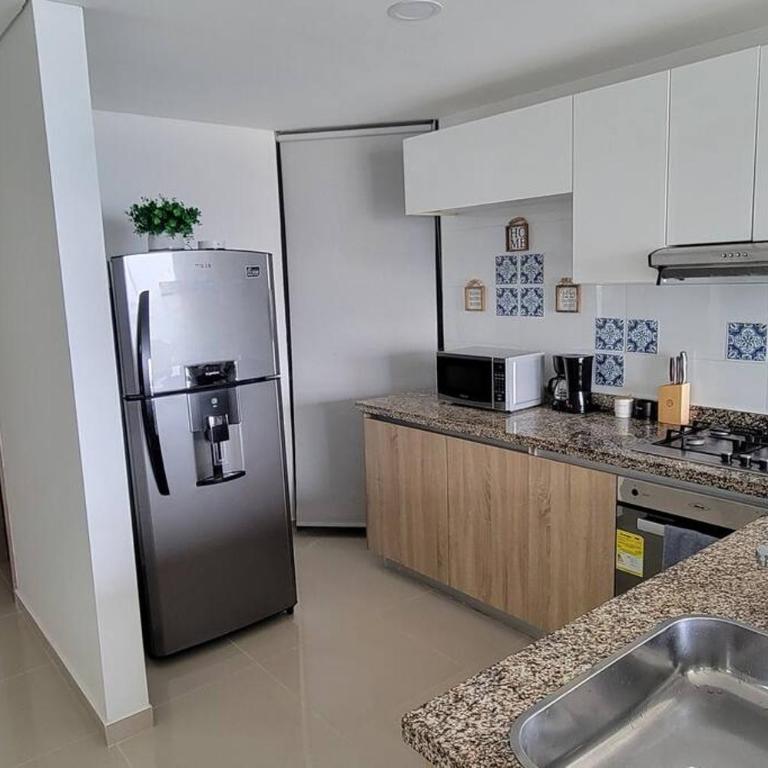 Stunning Infinity Pool, Balcony, steps from Walled City & Marbella Beach - Three-Bedroom Apartment - 46