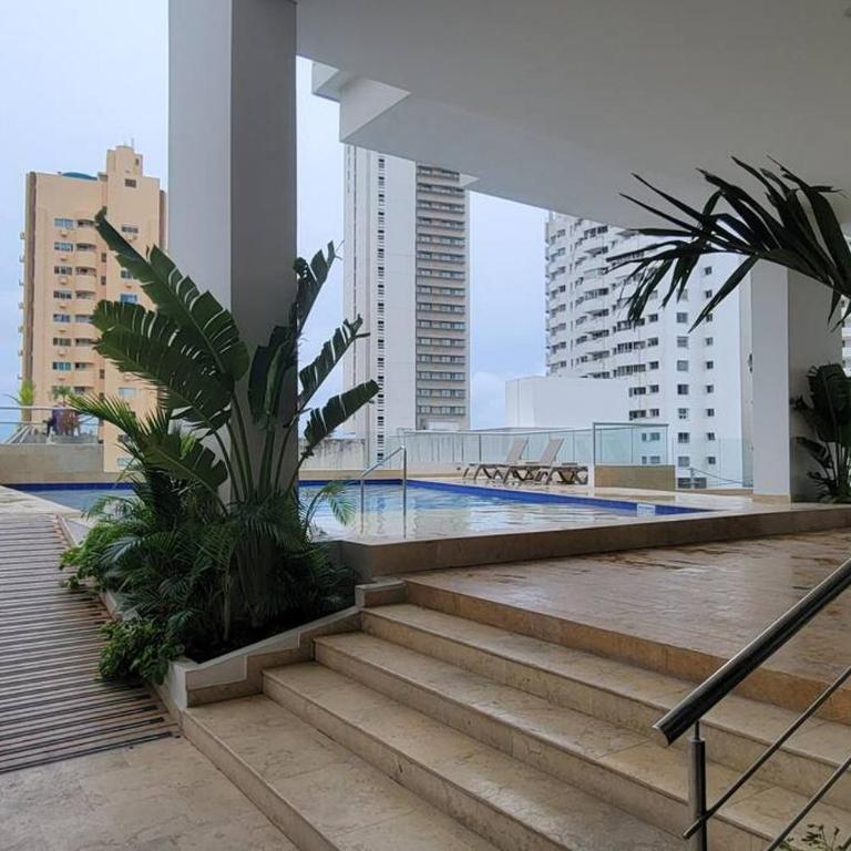 Stunning Infinity Pool, Balcony, steps from Walled City & Marbella Beach - Three-Bedroom Apartment - 52