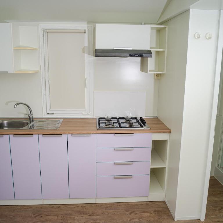 Punta Falconera camping & village - Chalet con 2 Camere da Letto - 4