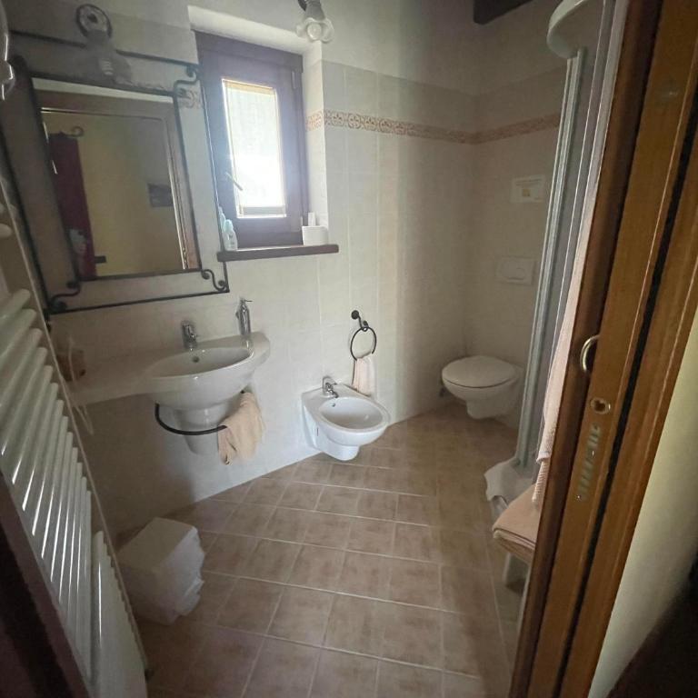 Hotel Le Petit Abri - Camera Tripla - 5