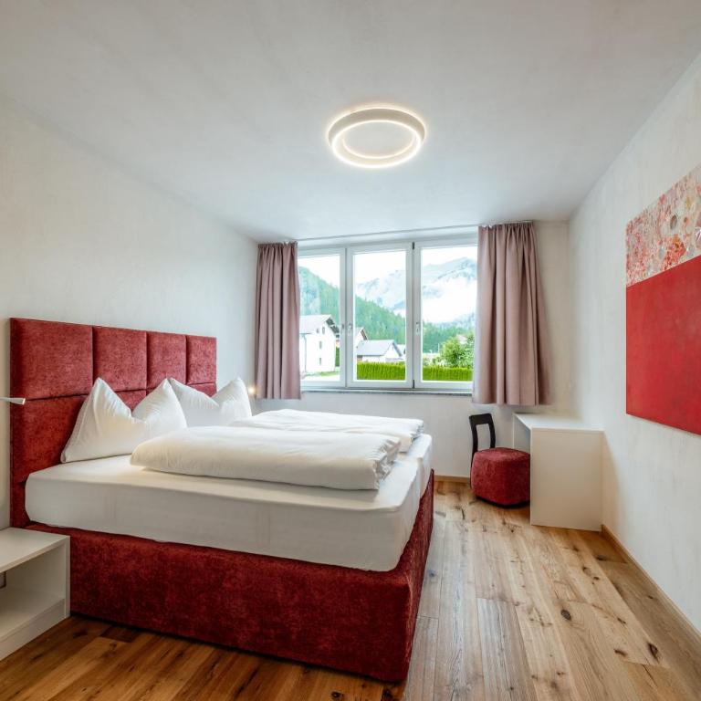 Ferienwohnungen Karlingerhof am See - Apartment mit 1 Schlafzimmer und Seeblick - 16