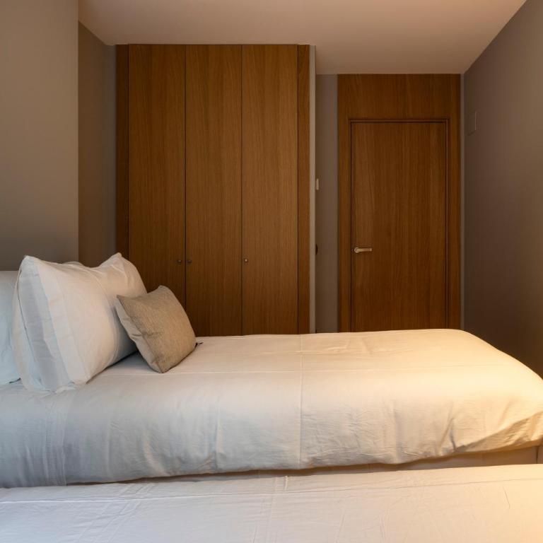 Un diamante de montaña l A Pie De Pistas - Gimnasio - Sauna - Piscina l 8Pax l by BonesVacances - Three-Bedroom Apartment - 32