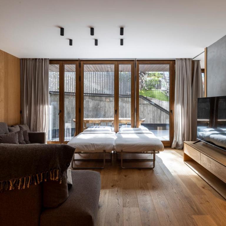 Un diamante de montaña l A Pie De Pistas - Gimnasio - Sauna - Piscina l 8Pax l by BonesVacances - Three-Bedroom Apartment - 34