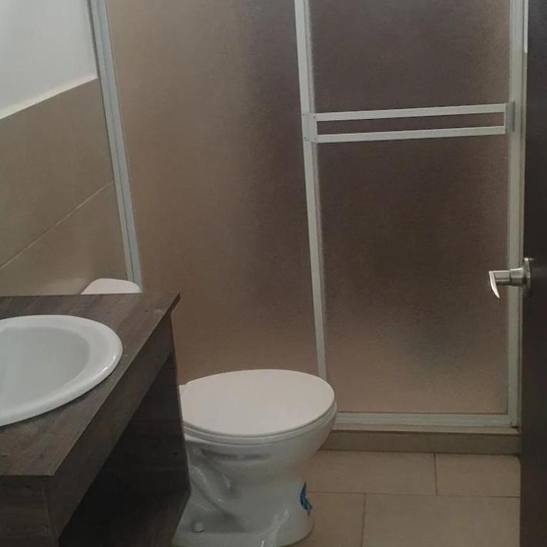 Casa familiar cerca a la playa - Three-Bedroom House - 23