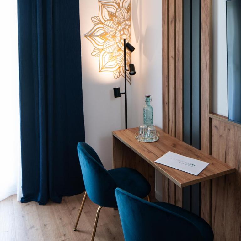 Pension Auszeit Velden - Junior Suite mit Terrasse - 4