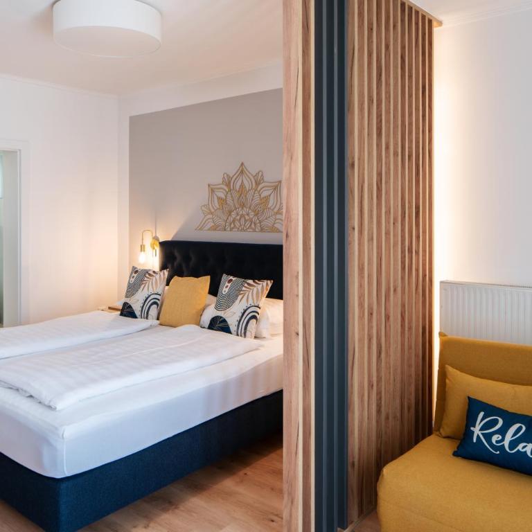 Pension Auszeit Velden - Junior Suite mit Terrasse - 10