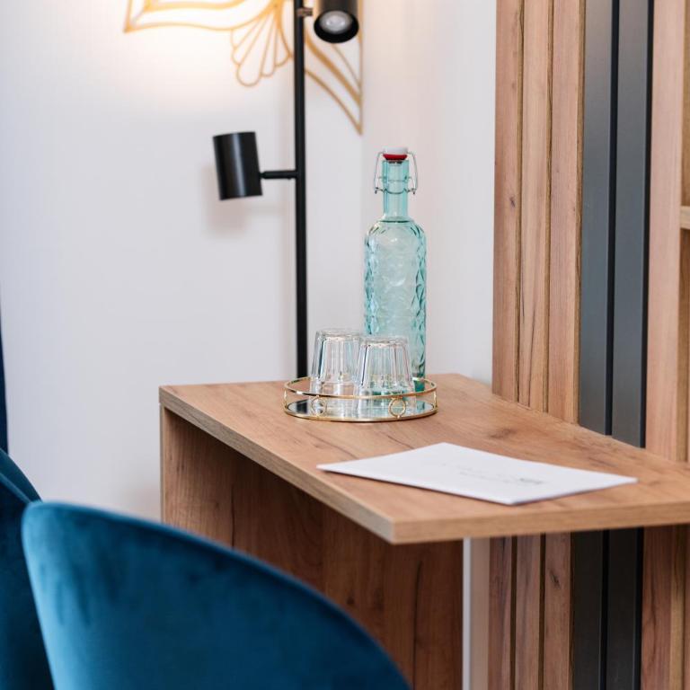 Pension Auszeit Velden - Junior Suite mit Terrasse - 9