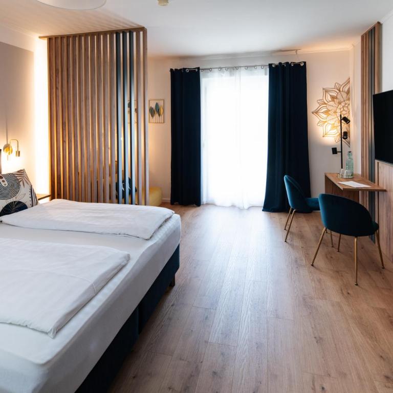 Pension Auszeit Velden - Junior Suite mit Terrasse - 2