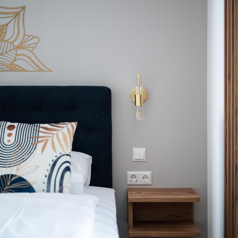 Pension Auszeit Velden - Junior Suite mit Terrasse - 16