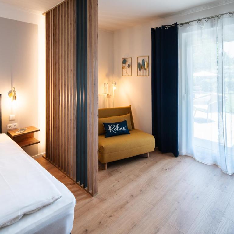 Pension Auszeit Velden - Junior Suite mit Terrasse - 19