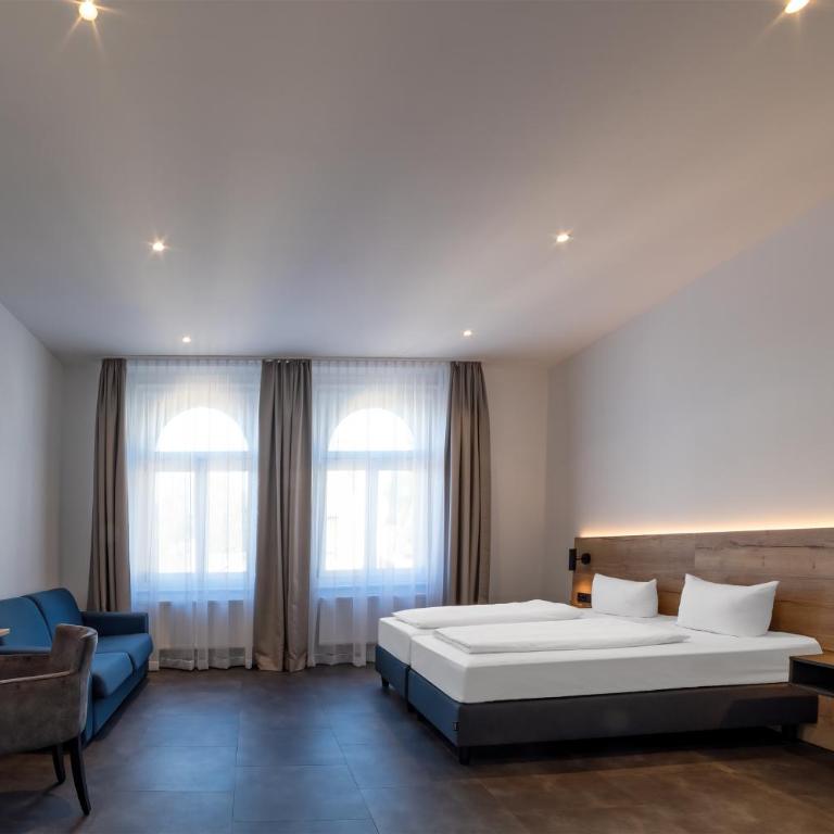 Drexel´s Parkhotel - Business Doppelzimmer mit Zustellbett - 4