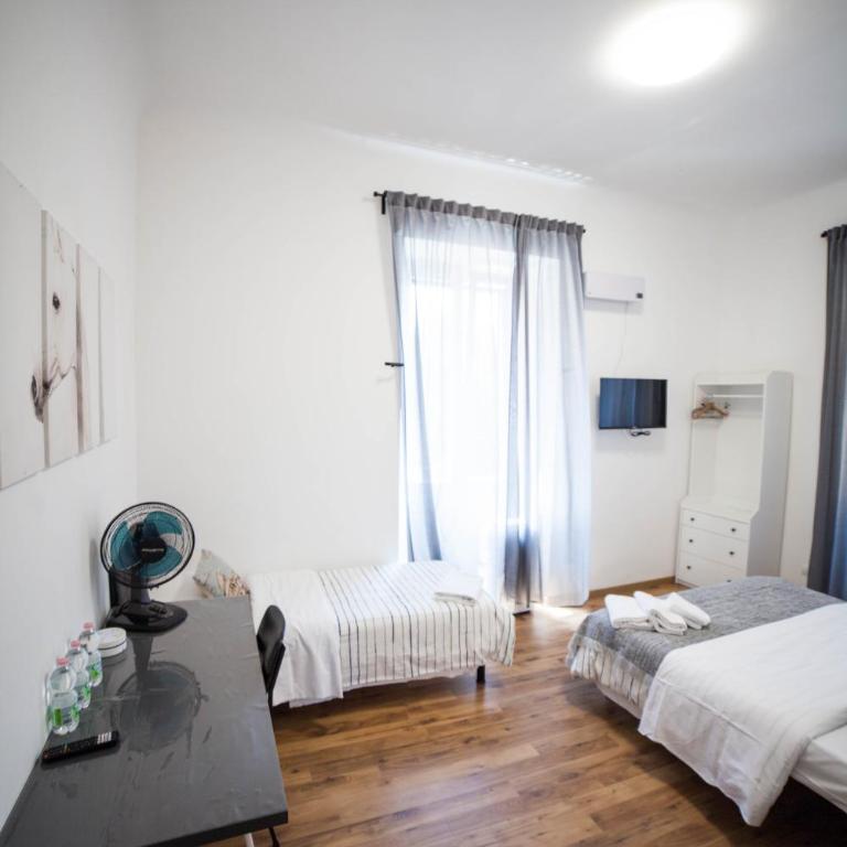 Cosmo GuestHouse - Camera Tripla con Bagno Privato - 16