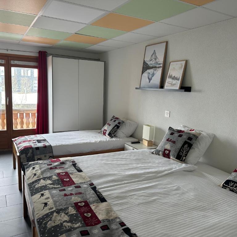 Chalet Montriond - Bike & Ski - Standard Dreibettzimmer - 5