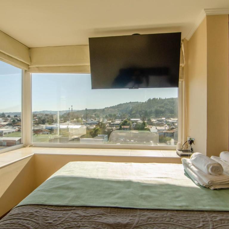 Edificio Borde Plaza familiar 5 personas con estacionamiento exclusivo - Apartamento de 2 dormitorios - 2