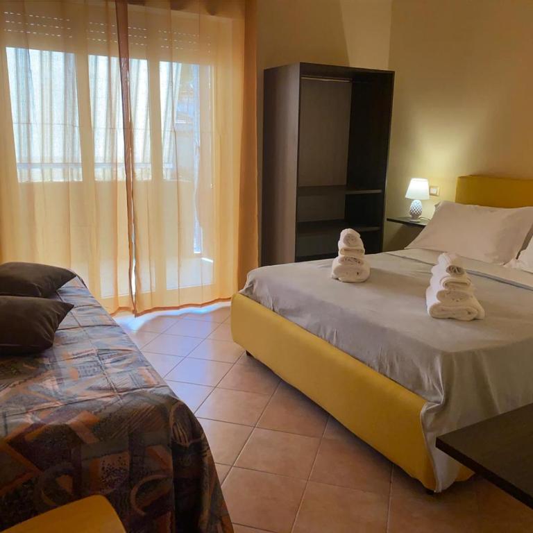 Musetta sicilian hospitality - Camera Tripla con Vista Città - 2