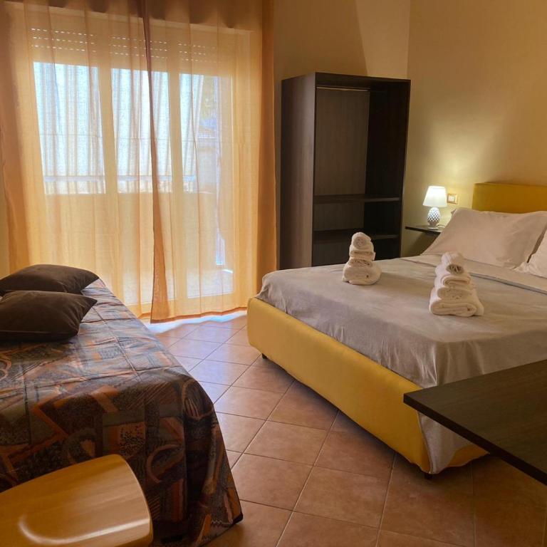 Musetta sicilian hospitality - Camera Tripla con Vista Città - 10
