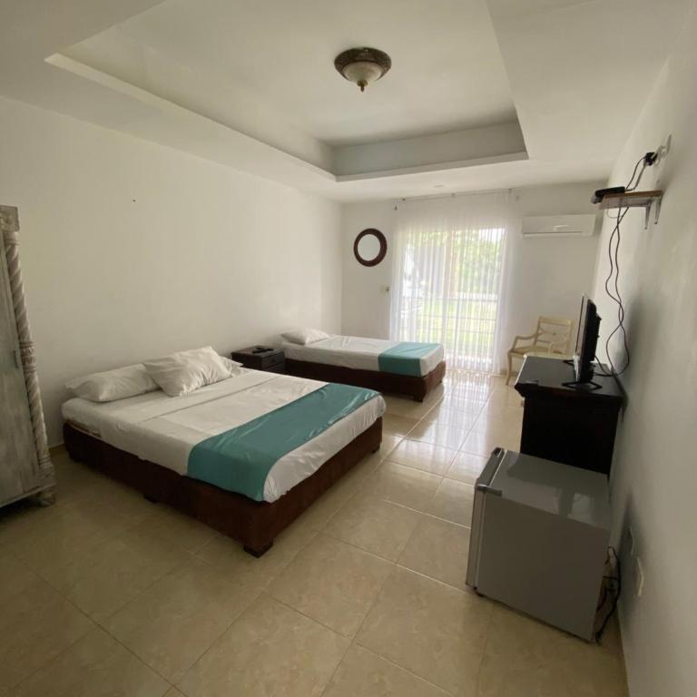 hotel turqueza inn - Habitación Cuádruple Superior - 4
