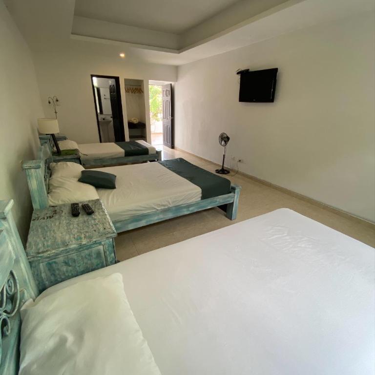 hotel turqueza inn - Habitación Cuádruple Estándar - 1