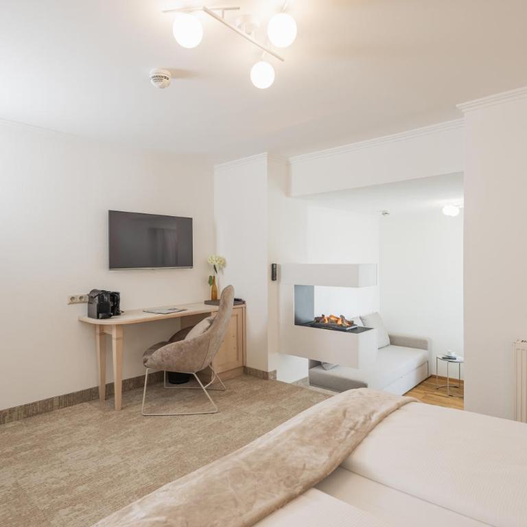 das zellersee - Familienzimmer mit Balkon und elektrischem Kamin - 2