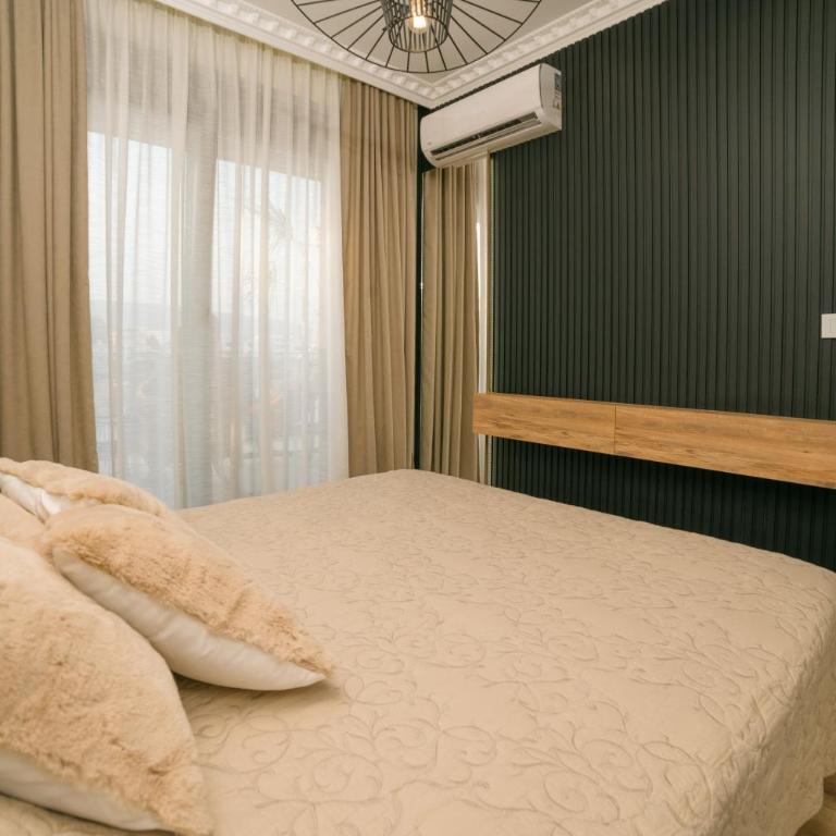 Luxury Apartment with Green Terrace, Porto Milena View and Private Garage - One-Bedroom Apartment - 68