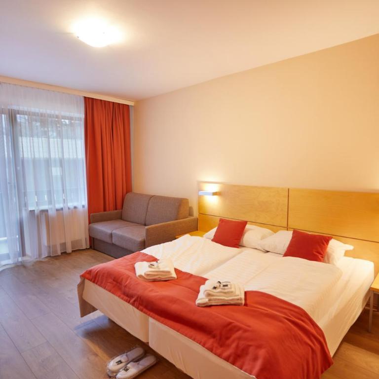 Residence AlpenHeart - Doppelzimmer mit Balkon und Bergblick - 1