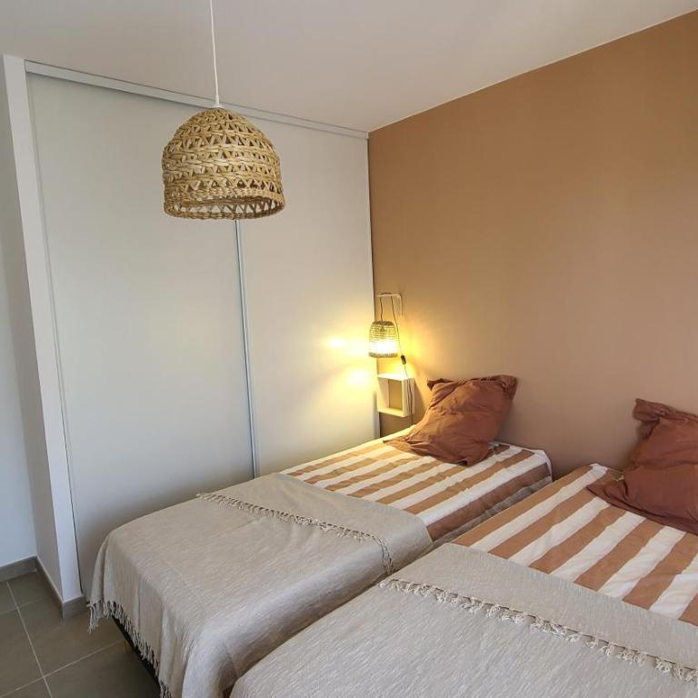 Appartement climatisé T3 vue mer de 63 M2 - 2 chambres et belle terrasse de 23 M2 - Appartement 2 Chambres avec Terrasse et Vue sur la Mer - 21