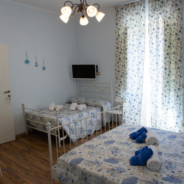 I VACANZIERI - Camera Deluxe (2 Adulti + 1 Bambino) - 7