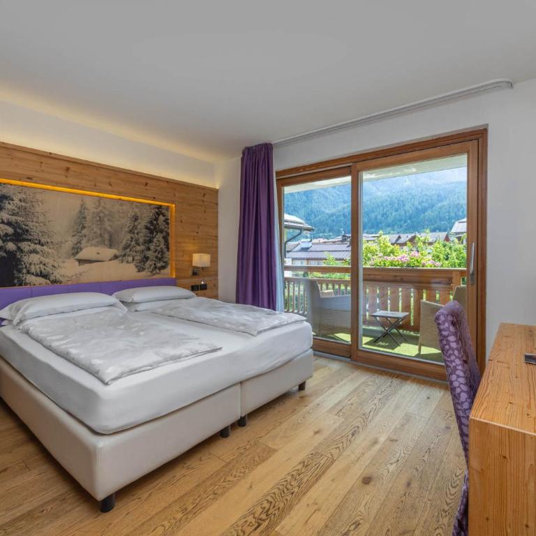 Alpholiday Dolomiti Wellness & Family Hotel - Suite Junior (4 adultos) - 1