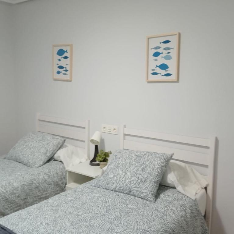 Apartamento Exclusivo Playa San Lorenzo con Parking Gratis - Apartamento de 3 dormitorios - 21