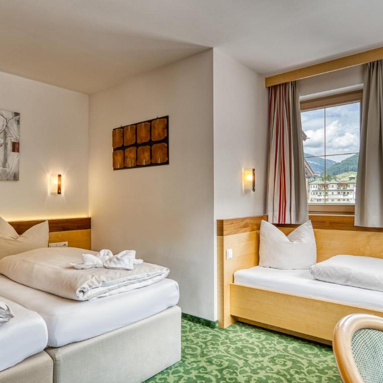 SonnenHOF hotel gerlos centrum - Comfort Dreibettzimmer mit Balkon - 8