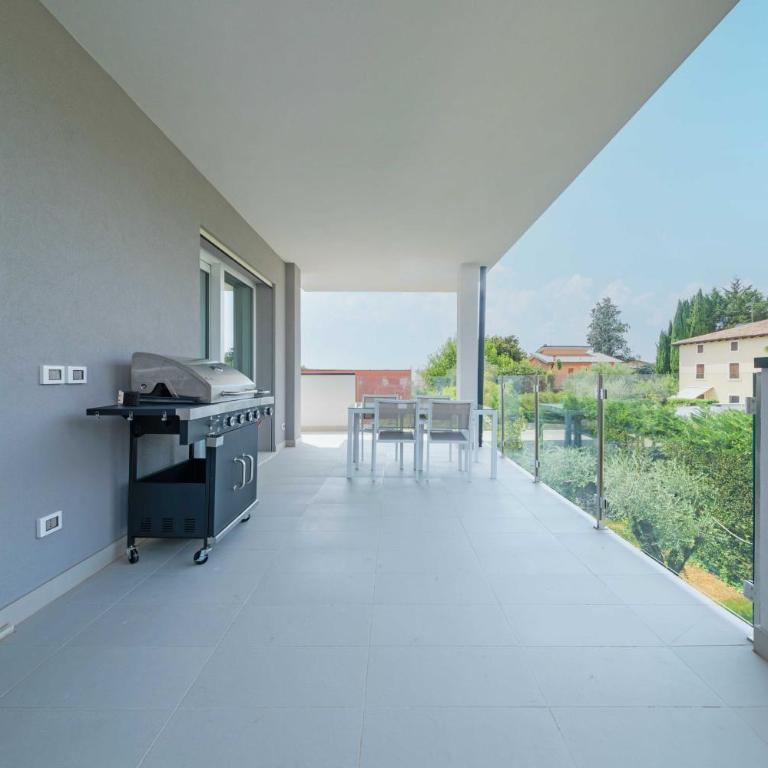 ApartmentsGarda - Residenza Maycol - Appartamento con 2 Camere da Letto e Terrazza - 12