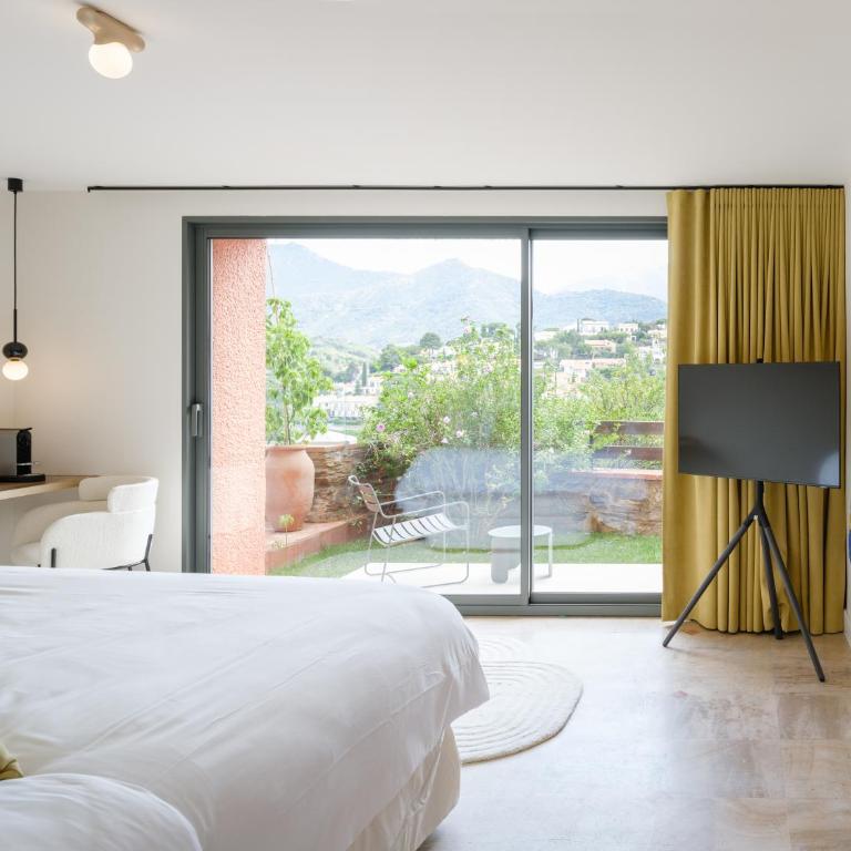 Maison Nova - Boutique Hôtel & Spa - Port d'Avall - Chambre Double avec Jardin et Baignoire Extérieure - Vue sur Montagne - 1