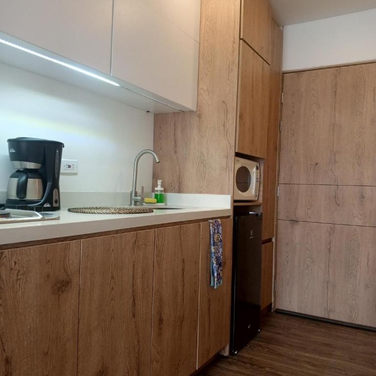 Soul Santa Bárbara executive, wifi 300 megas, Big Queen size bed, Smart tv Netflix, Walking distance to Unicentro Mall, Starbucks in front of the building, Top location - Apartamento de 1 dormitorio - 15
