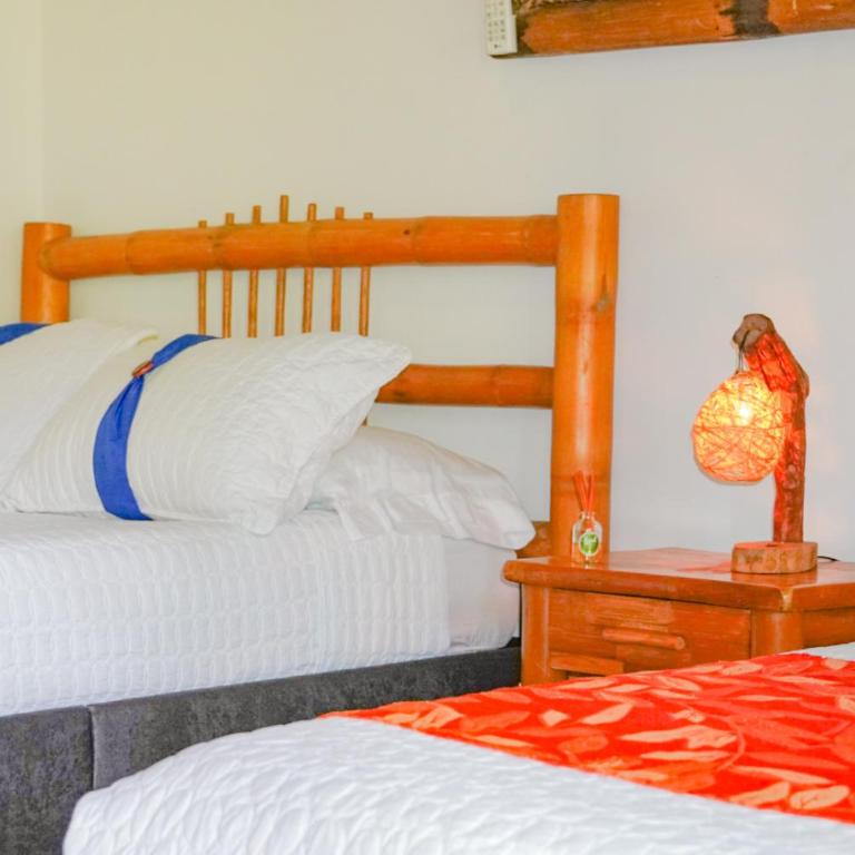 LA GRANJA ECOHOTEL - Habitación Cuádruple - vistas al jardín - 4
