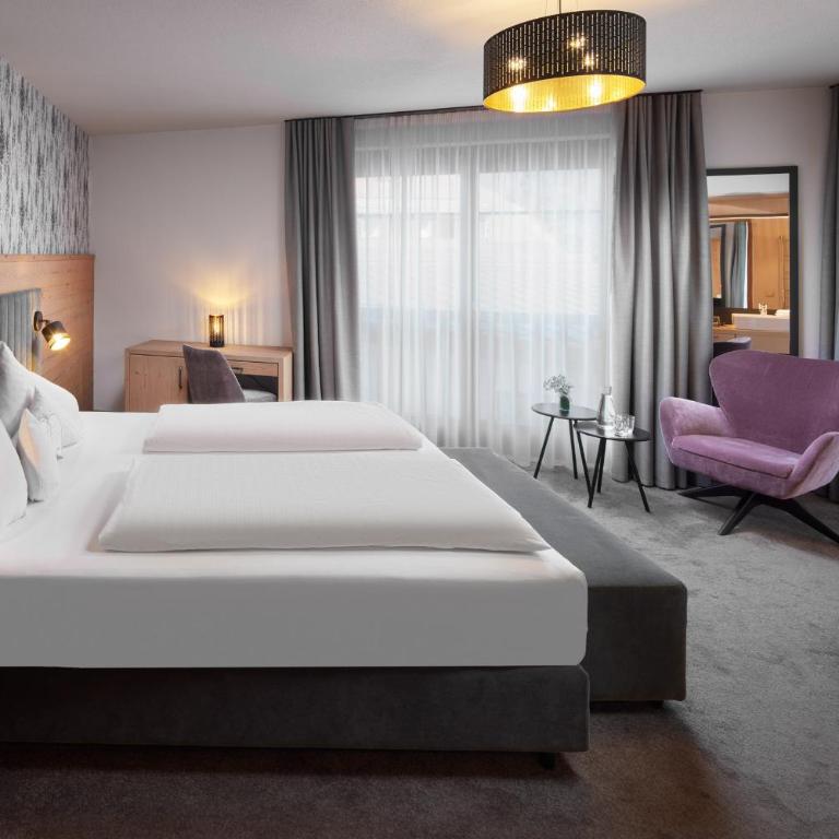 Alpinresort Stubaierhof 4S - Doppelzimmer mit Balkon - 4