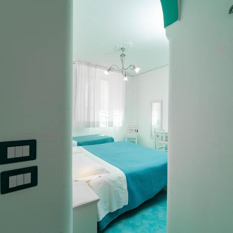 Albergo S. Andrea - Camera Tripla Basic - 10